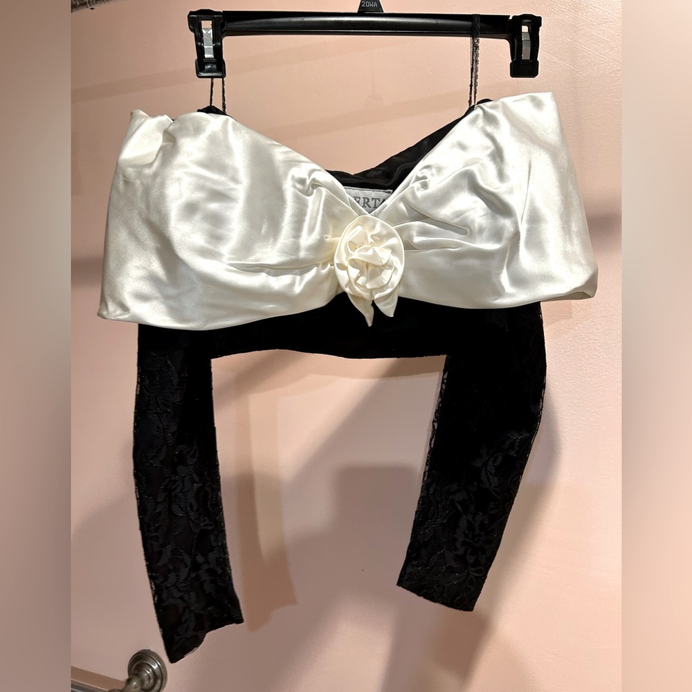 black lace sleeves with white silk off the shoulder wrap around.
